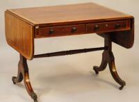 An Edwardian mahogany crossbanded sofa table