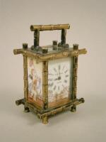 A late 19thC/early 20thC gilt brass carriage time piece