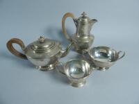 A silver four piece tea service