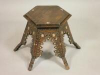 An unusual Middle Eastern type hardwood and mother of pearl inlaid table