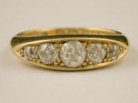 An 18ct gold gypsy or boat set diamond ring