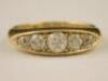 An 18ct gold gypsy or boat set diamond ring