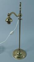 An early 20thC brass adjustable table lamp