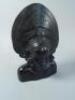 A Balinese style ebonised wood bust