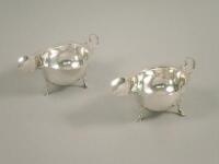 A pair of George V silver sauce boats