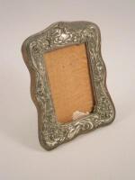 An Edwardian silver mounted photograph frame