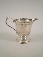 An Edwardian small silver cream jug