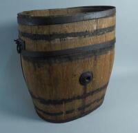 A coopered oak and iron barrel with two handles