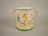 A Staffordshire pottery two handled loving cup