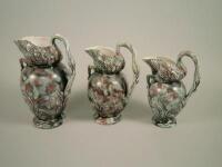 A graduated set of three Victorian jugs