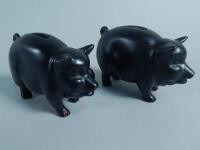 A pair of pig money banks