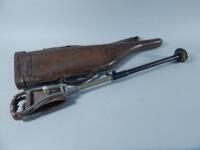 A leather leg of mutton gun case