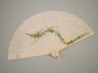 An ivory fan with a painted decoration of flowers