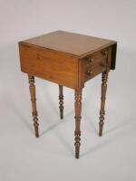 An early 19thC mahogany drop leaf work table