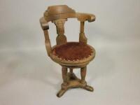 A late Victorian walnut office chair