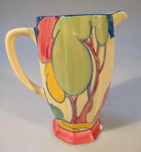 A Clarice Cliff Bizarre Fantasque pitcher in the Blue Roof Autumn pattern