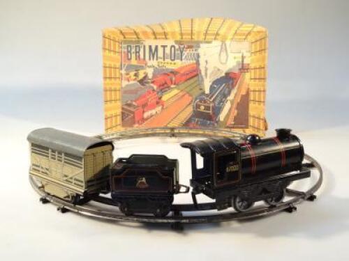 A Brimtoy tin plate British Railways train