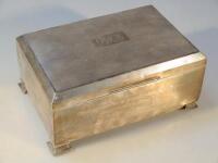 A silver cigarette box