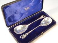 A pair of Edward VIII Art Nouveau design silver serving spoons London 1902