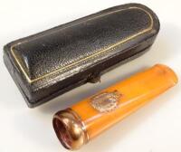 An Edwardian meerschaum cheroot holder with 9ct gold mount and vacant garland style cartouche. 8cm l