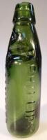 A Phillips of Stamford 6oz green glass codd bottle