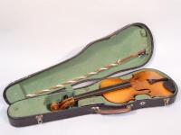 An early 20thC pine cased violin