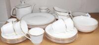 A Royal Doulton 'Gold Concord' pattern part dinner service