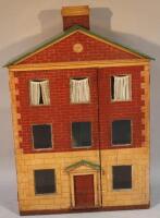 A large freestanding child's dolls house