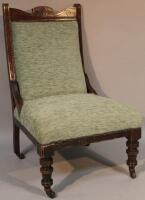 An Edwardian walnut stained occasional chair