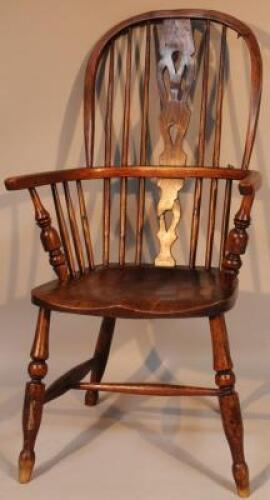 A 19thC ash and elm high back Windsor chair