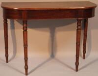 An early 19thC mahogany D end side table