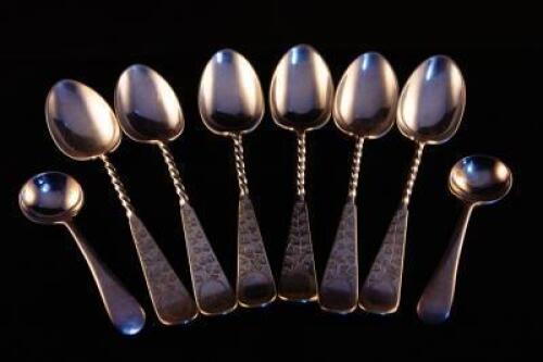 A silver honey spoon