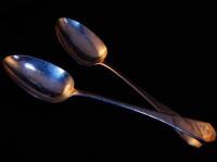 A pair of George III silver serving spoons