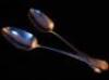 A pair of George III silver serving spoons