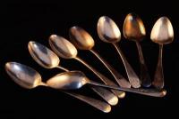 Eight Georgian silver teaspoons