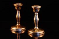 A pair of Elizabeth II silver dwarf candlesticks