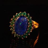 A 9ct gold opal and emerald dress ring