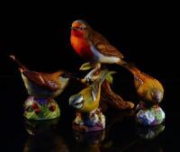 Three Royal Worcester bird figures