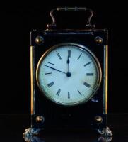 A brass and ebonised carriage clock