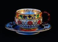 A Chamberlain Worcester reticulated tea cup and saucer