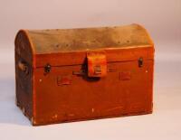 A leather and fabric wooden framed trunk.