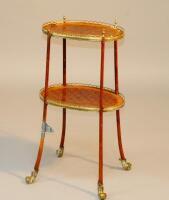 A French Kingwood inlaid and ormolu mounted two tier occasional table