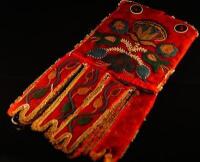 A heavily embroidered native sash