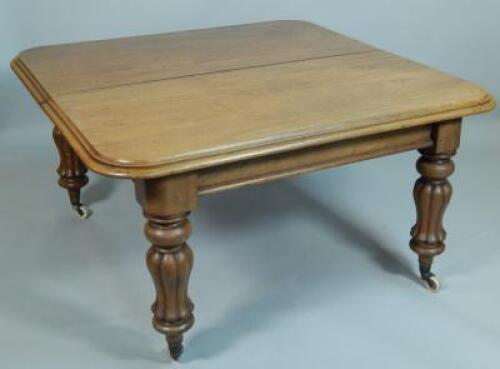 An early Victorian mahogany extending dining table