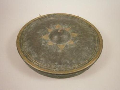 An oriental bronze gong