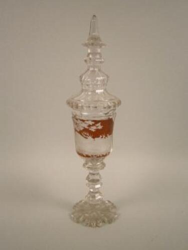 A 19thC Bohemian ruby tinted and clear glass goblet and cover