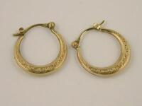 A pair of hoop earrings