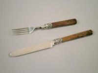 An early 19thC silver knife and fork set