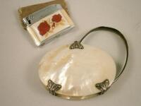 A continental white metal and mother-of-pearl magnifying glass