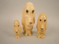 A graduated set of three Sylvac dogs